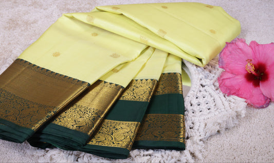 Lemon Yellow Pure Silk Saree with Dark Green Peacock Zari Border(Code PSS-36)